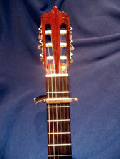 Capo behind the Second fret